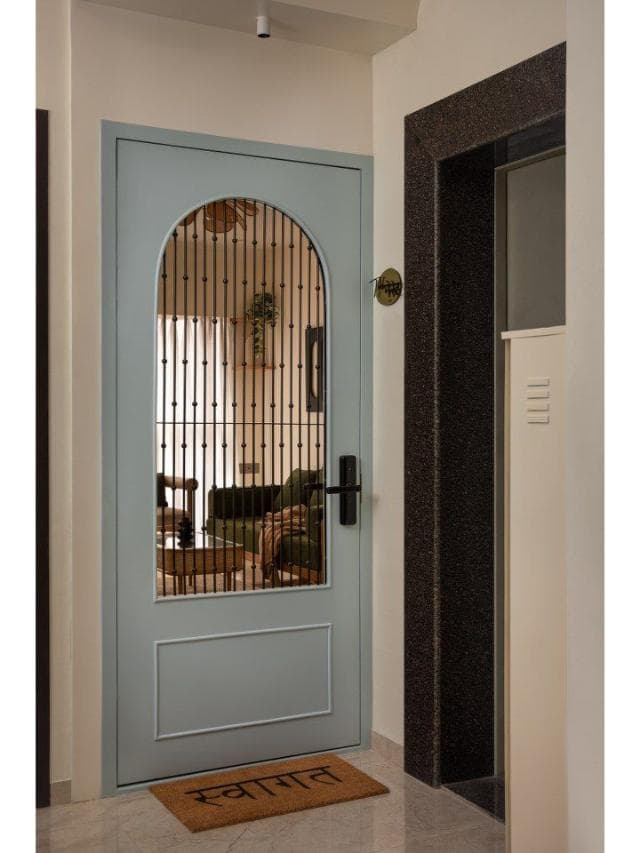 Modern light blue arched main safety door with grill and mesh design