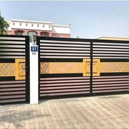 Heavy-duty mild steel sliding gate with wooden finish panel designs