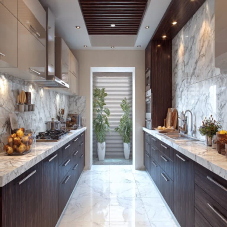 Elegant parallel kitchen interior featuring dark counters and aisle walkway